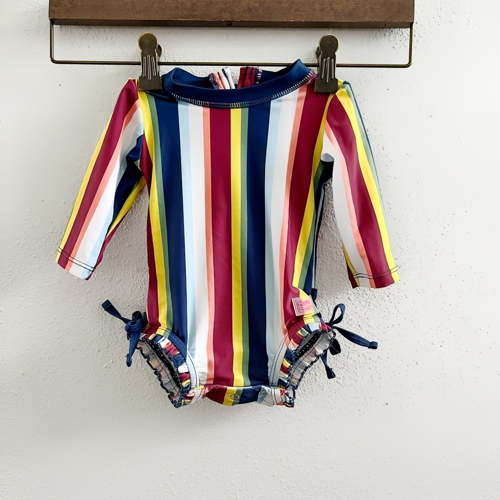 RUFFLEBUTTS One Piece Rashguard in the "Sunset‎ Stripe" Pattern Size 3-6 Months
